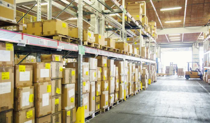 Warehouse shelves filled with inventory that may not be usable at point of need